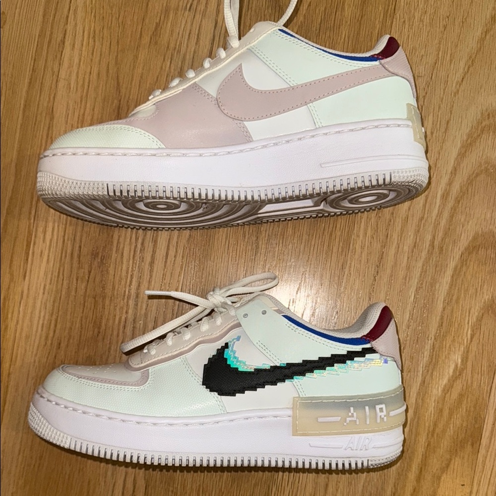 Nike Cream and Black Sneakers with Iconic Air Cushioning